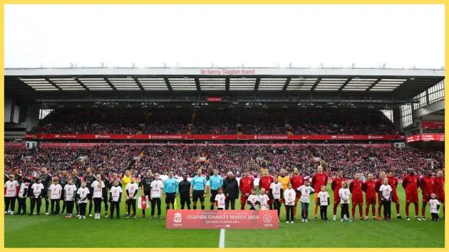 Players of Ajax Legends and Liverpool Legends line up on the pitch prior to the LFC Foundation charity match between Liverpool FC Legends and AFC Ajax Legends at Anfield on March 23, 2024