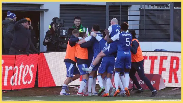 Paul Dawson of Macclesfield (obscured) celebrates scoring his team's first goal with teammates during the Emirates FA Cup Third Round match between Macclesfield and Crystal Palace