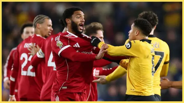Joe Gomez of Liverpool clashes with Joao Gomes of Wolverhampton Wanderers