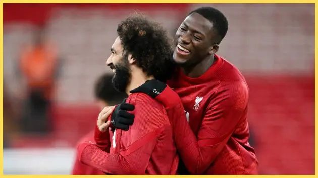 Mohamed Salah and Ibrahima Konate of Liverpool react as the team warms up prior to the Carabao Cup Quarter Final match between Liverpool and West Ham United at Anfield on December 20, 2023