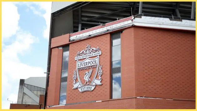 A picture of the Liverpool crest on the wall of Anfield