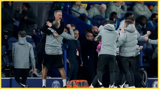 Luis Enrique celebrates with his PSG coaching staff