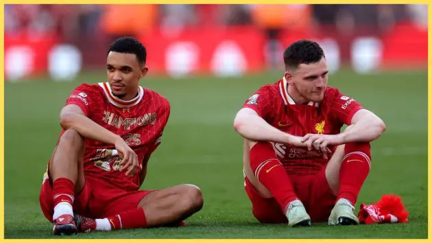 Trent Alexander-Arnold and Andrew Robertson of Liverpool look on, as they celebrate the teams victory and confirmation of winning the Premier League title after the Premier League match between Liverpool FC and Tottenham Hotspur FC at Anfield