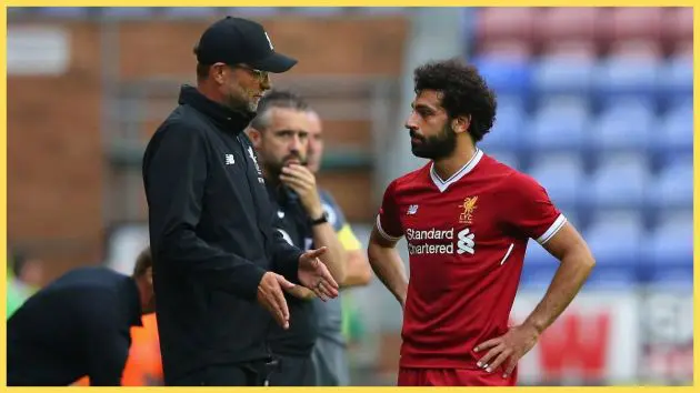 Jurgen Klopp the manager of Liverpool talks with Mohamed Salah of Liverpool during the pre-season friendly match between Wigan Athletic and Liverpool at DW Stadium