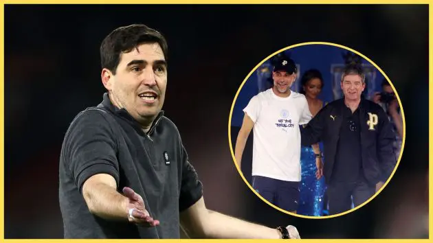 Liverpool manager Andoni Iraola holds his arms out next to a picture of Pep Guardiola and Noel Gallagher.