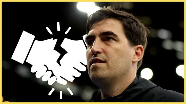 Liverpool manager Andoni Iraola looks on next to a pair of white hands shaking together with a crack in the middle.