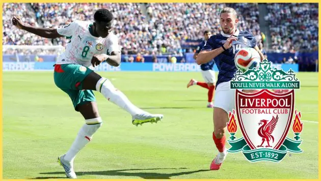 Lamine Camara's shot is blocked down by Adrien Rabiot